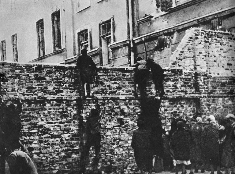 1280px-Food_smuggling_Warsaw_Ghetto.jpg 1280px-Food_smuggling_Warsaw_Ghetto.jpg