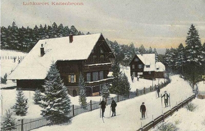 Grußpostkarte 1910 mit dem Jagdhaus im Vordergrund,