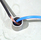 Detail: Außenleiter hat Kabelschaden